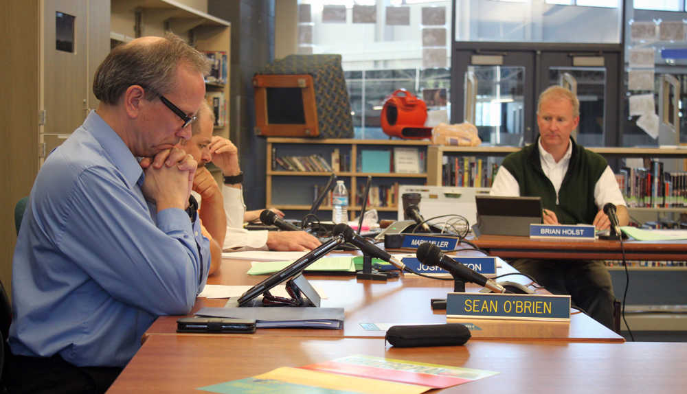 In this file photo taken June 14, 2016, the Juneau School Board approves contracts with the teachers and support staff unions at a regular meeting.