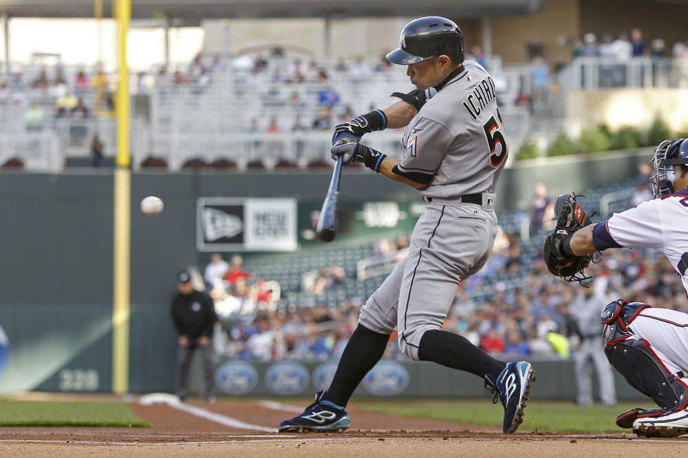 Miami Marlins' Ichiro Suzuki hits a single against the Minnesota Twins during the first inning of a baseball game Tuesday, June 7, 2016, in Minneapolis. The Twins won 6-4 in 11 innings. (AP Photo/Bruce Kluckhohn)