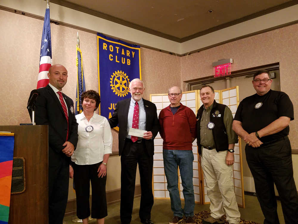 Check presentation from The Rotary Club of Juneau to the UAS Scholarship Endowment Fund. Pictured from left to right: John Blasco, Lynne Johnson, Chancellor Rick Caulfield, Scott Fischer, Denny DeWitt and Steve Allwine.