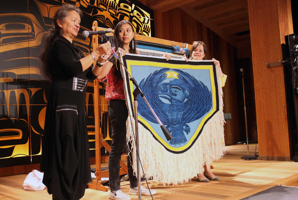 Clarissa Rizal, left, talks about weaving the Thunderbird Chilkat robe at a symposium during Celebration 2016.