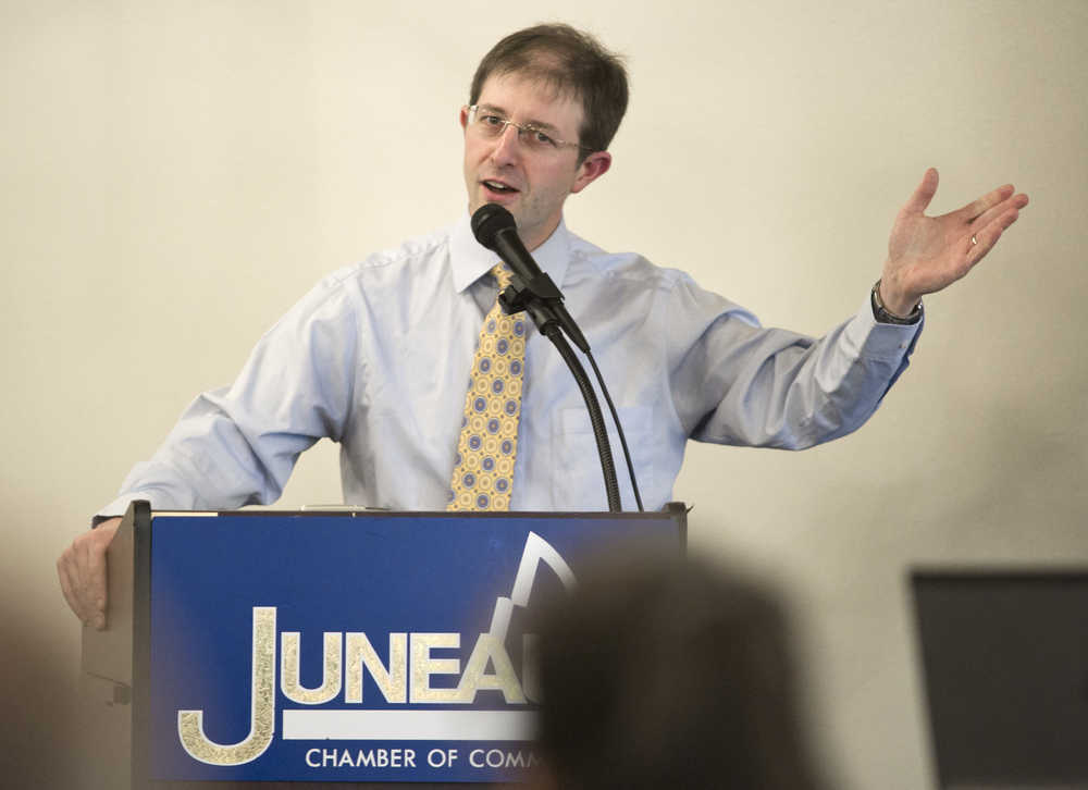 Juneau's Deputy Mayor Jesse Kiehl gives an update on the status of local marijuana businesses to the Chamber of Commerce at the Moose Lodge on Thursday.