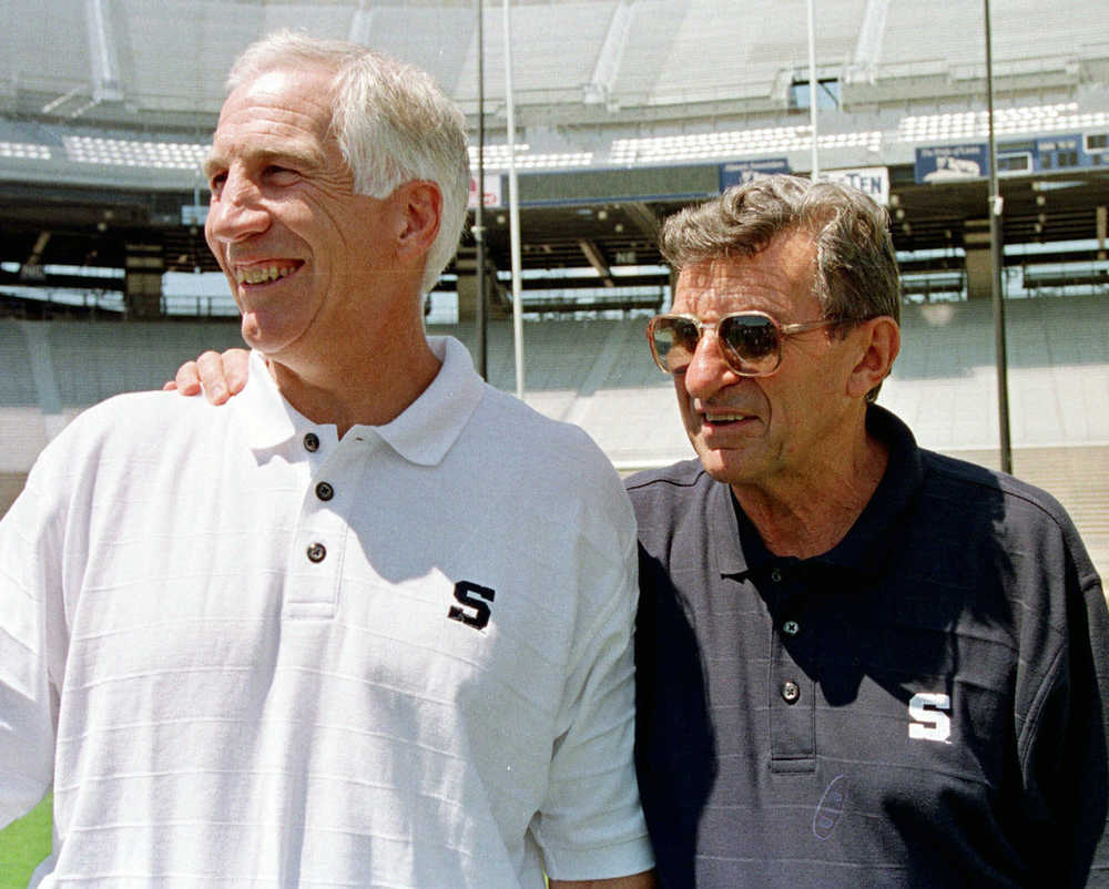 FILE - In this Aug. 6, 1999, file photo, Penn State football coach Joe Paterno, right, poses with his defensive coordinator Jerry Sandusky, during the college football team's media day in State College, Pa.  Newly released court documents provided new details Tuesday, July 12, 2016, on allegations that Paterno was told in 1976 about a sex abuse accusation against  Sandusky, and that some of Paterno's assistants witnessed improper contact between Sandusky and children in the 1980s. Sandusky, who was arrested in 2011, is serving 30 to 60 years in prison on a 45-count child molestation conviction.  (AP Photo/Paul Vathis, File)