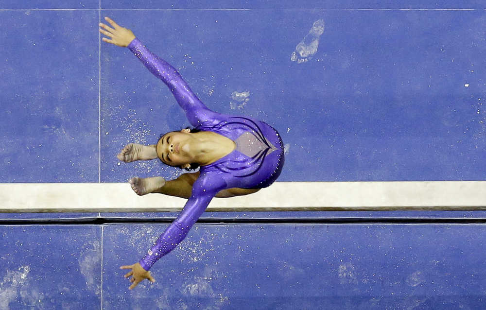 Lauren Hernandez competes on the balance beam during the women's U.S. Olympic gymnastics trials on July 8 in San Jose, California.