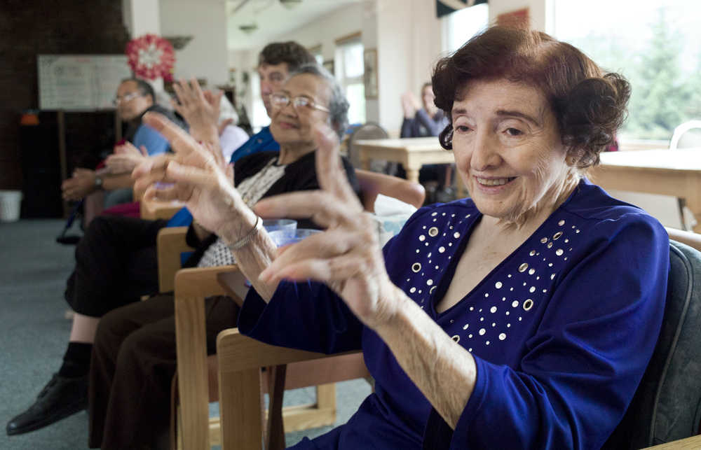 Jennie Hinch, right, and others participate in a sing-along at the Bridge Adult Day Program on Friday. The Juneau Community Foundation and the City and Borough of Juneau recently announced three grants totaling $97,000 for senior care. The grants, awarded to Catholic Community Services' (CCS) Southeast Senior Services Division, will be used to fund the organization's Juneau Senior Nutrition Program, The Bridge Adult Day Program, and Senior Wrap Around Services in Juneau.  CCS, which also received a grant for its hospice program, was one of 12 organizations to receive grants as part of the 2016 CBJ Social Service Grants.