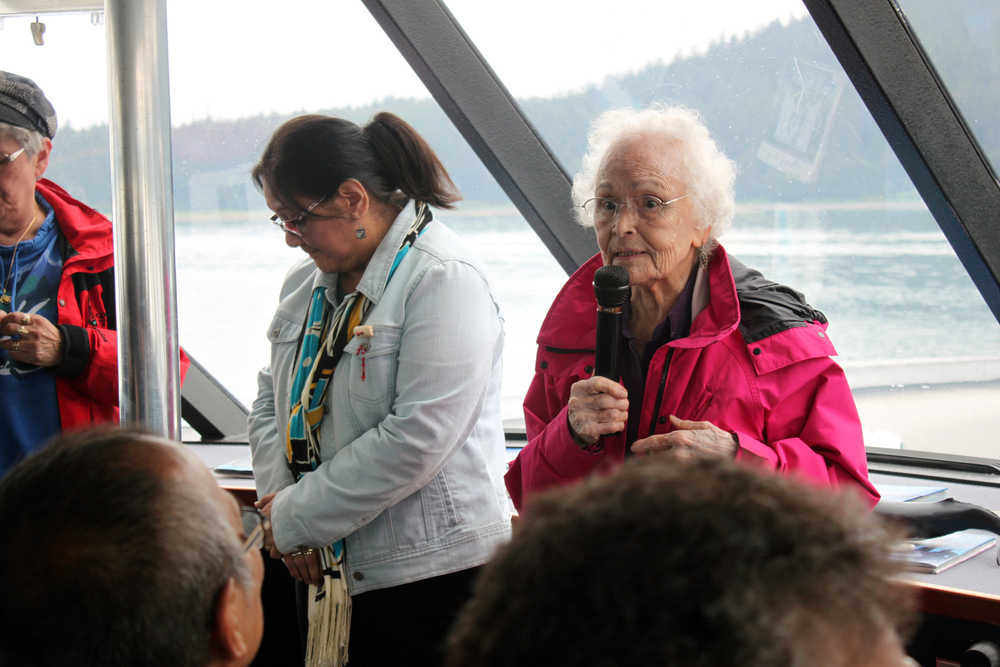 The Douglas Indian Association hosted an all-day boat trip to former Native village sites and the Taku Inlet on Friday. In this photo, Tlingit elder Marie Olson welcomes everyone to the homeland of the A'akw Kwáan. DIA tribal administrator Andrea Cadiente-Laiti stands next to her. 