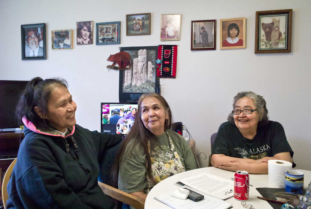 Sisters Laura Sheldon, Myrna Brown and Maureen Brown (left to right) gather at Maureen's apartment to plan a community event at Twin Lakes on Sunday from 2-5:30 p.m. for families across Juneau to gather and focus on healing and culture. The three sisters are also working on their own healing - each woman has lost one or more of her children to violent deaths in different Alaska cities.
