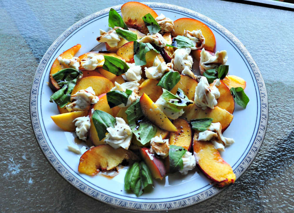 This peach caprese salad is perfect for summer.