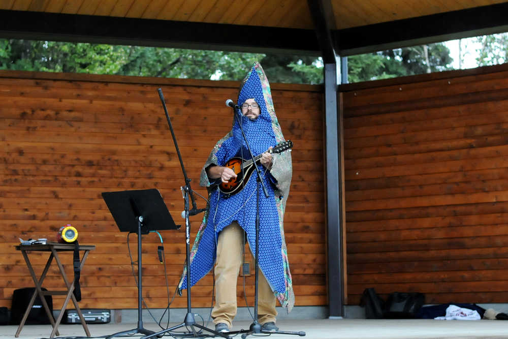 Photo by Elizabeth Earl/Peninsula Clarion Dan Pascucci, the education specialist for the Kenai Watershed Forum, treats the crowd to a rendition of "Sea Stars Are Not Starfish" on Friday, Aug. 5, 2016 at Soldotna Creek Park in Soldotna, Alaska. After 10 years, Pascucci will leave his position with the local conservation organization to take a job in Kentucky.