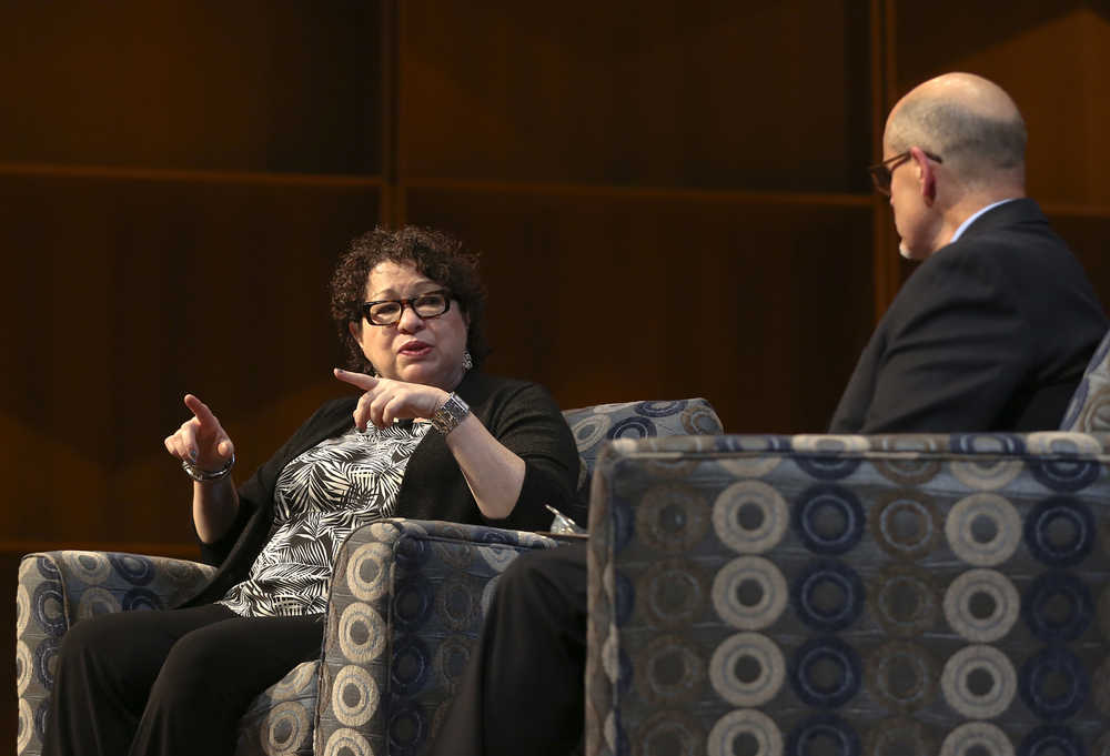 In this Sunday, Aug. 14, 2016 photo, U.S. Supreme Court Associate Justice Sonia Sotomayor answers a question from Robert Hannon during a conversation with her at the University of Alaska, Fairbanks' Davis Concert Hall in Fairbanks, Alaska. (Erin Corneliussen/Fairbanks Daily News-Miner via AP)