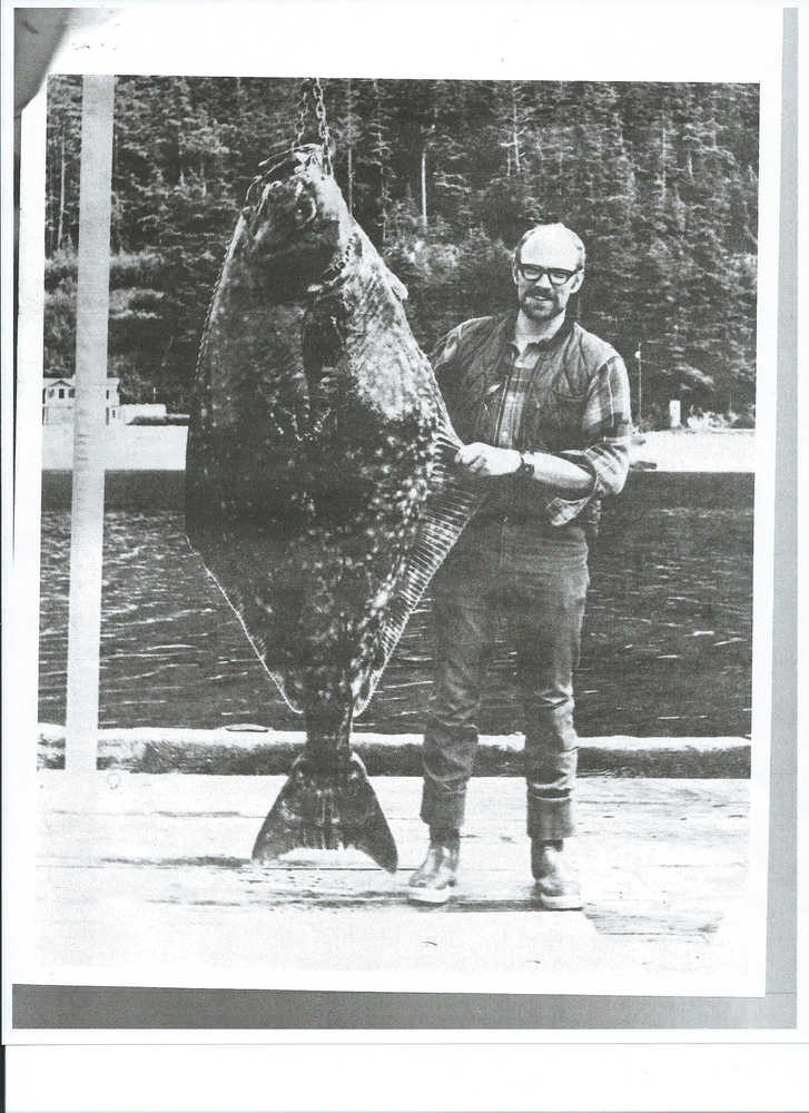 Gary Wilson poses with his 174 pound halibut during the 1970 Golden North Salmon Derby.