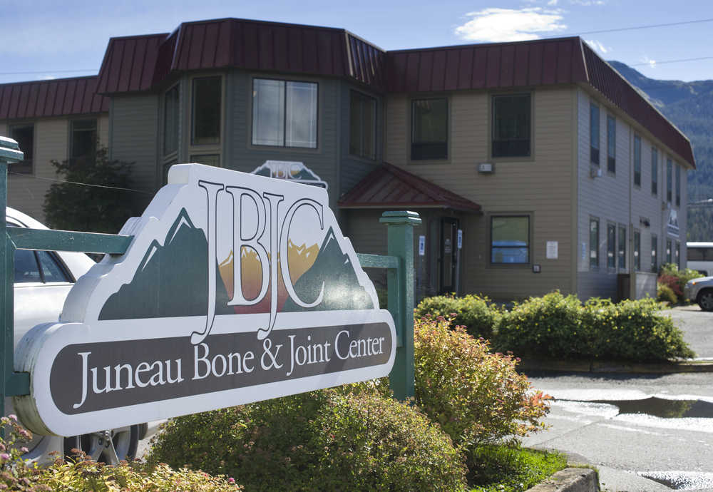 The former office manager of Juneau Boint & Joint Center has been charged with stealing half a million dollars.