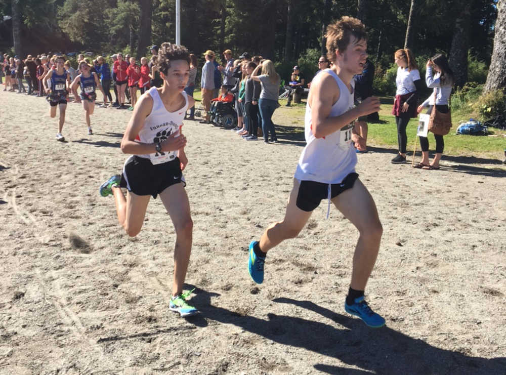 JDHS' Shadrach Stitz, left, and Jack White sprint it out at the finish of the Petersburg Invitational on Saturday.