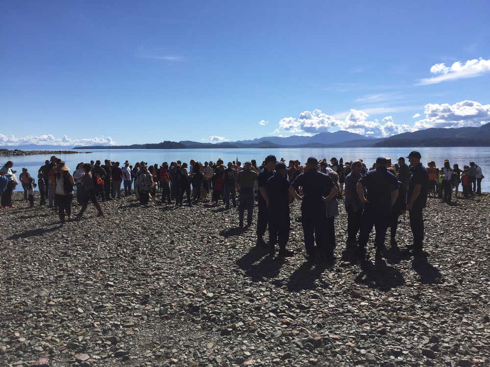 Visitors fill the beach to greet canoes arriving from Klawock, Kasaan, Ketchikan, and Juneau for the rededication of Náay í'Waans.