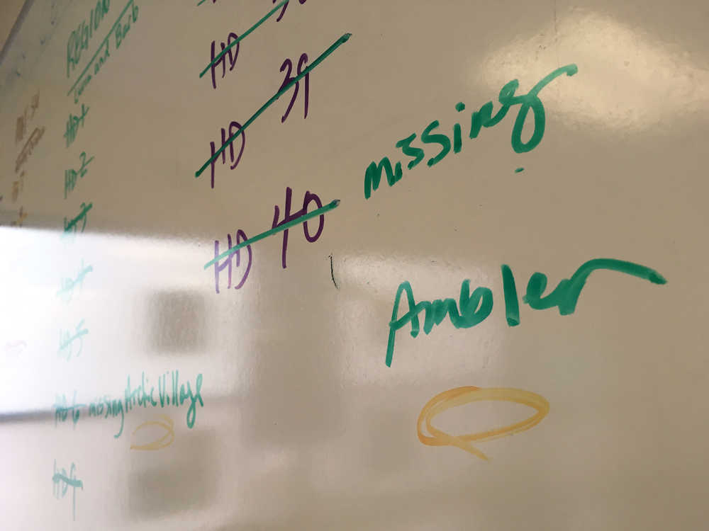 A dry-erase board at the Alaska Division of Elections headquarters in Juneau shows Ambler precinct's five absentee votes missing from the final tally.