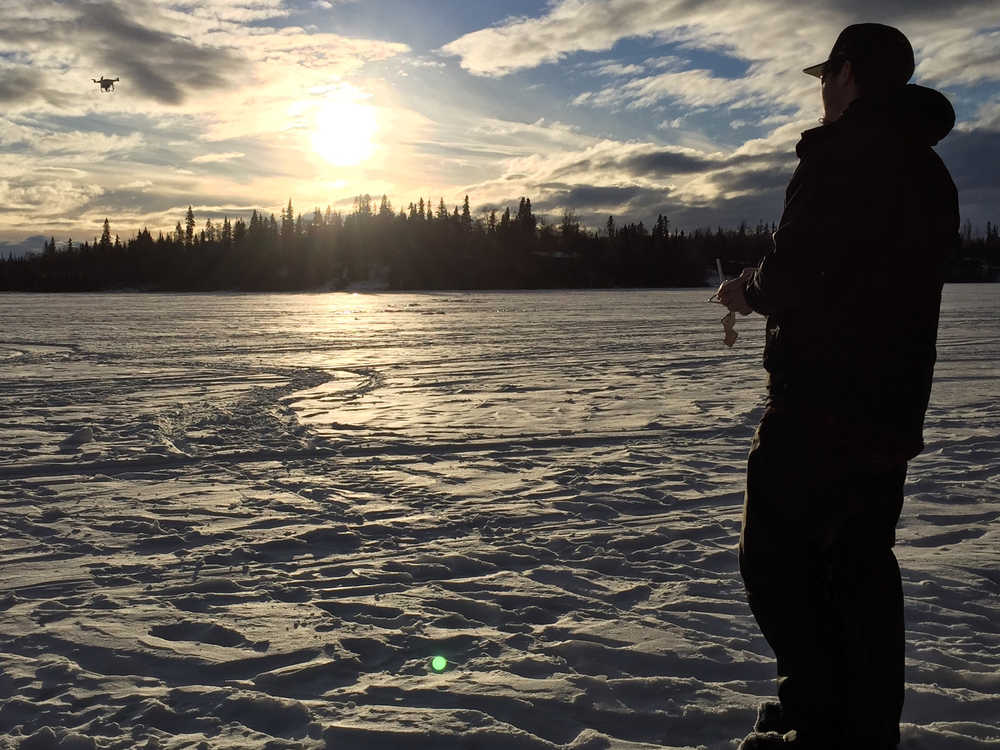 K2 Dronotics co-founder Ben Kellie operates a modified drone on Island Lake in Nikiski. He and his brother, Nick, were testing a prototype LiDAR system, a surveying technology that allows them to gather aerial data over snowy terrains.