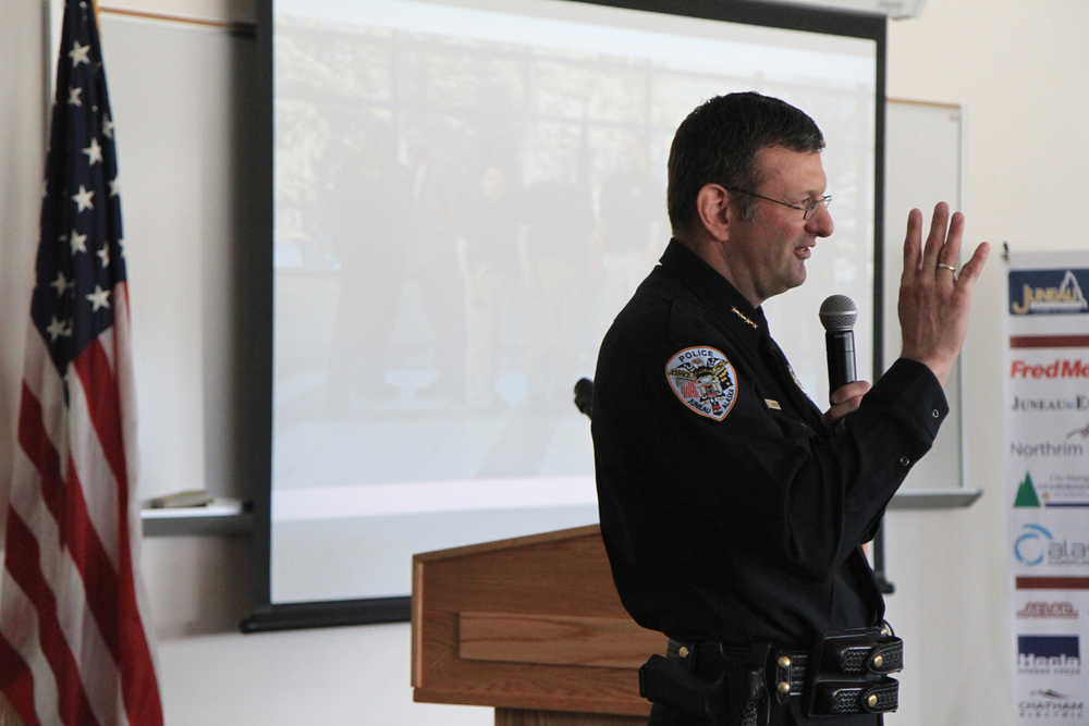 Juneau Police Chief Bryce Johnson speaks at a  Chamber of Commerce luncheon in August 2014.