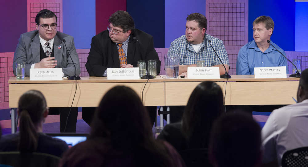 School Board Candidates Kevin Allen, left, Dan DeBartolo, Jason Hart and Steve Whitney, right, answer questions posed to them by KTOO and Juneau Empire reporters at the KTOO Studio on Monday. Voters will choose two of the four in next month's election.