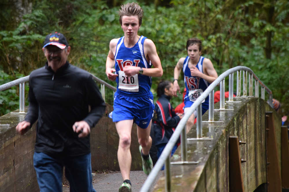 Sitka High School's David Wilcox leads the boys 1A, 2A and 3A race at Saturday's Region V cross country championship meet in Sitka.