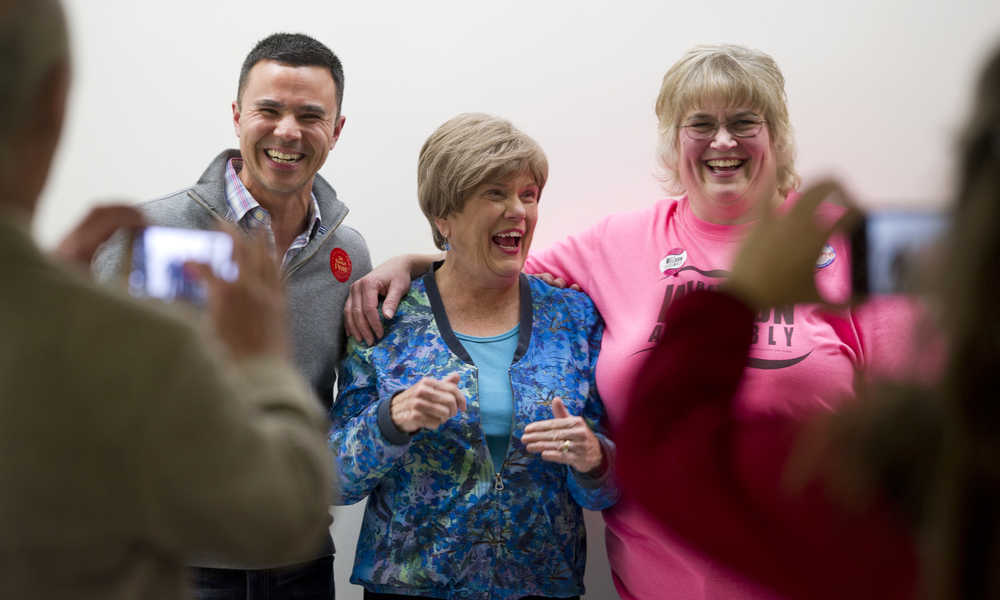 Norton Gregory, left, Mary Becker, center, and Beth Weldon pose for pictures in the Assembly chambers after winning their respective Assembly seats in the municipal election on Tuesday.