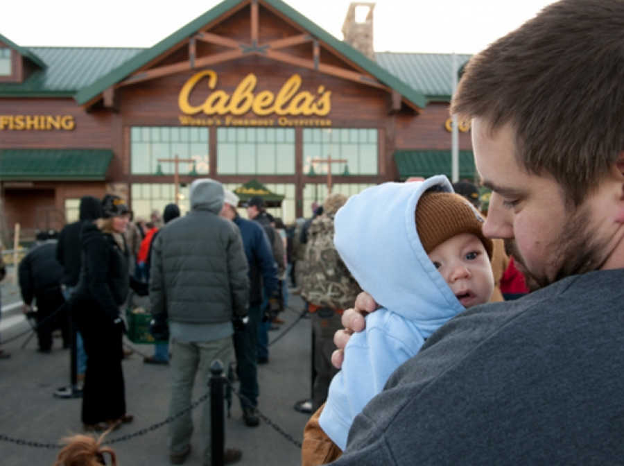 In this April 2014 photo, the grand opening of Cabela's in Anchorage is shown. Cabela's is being bought out by Bass Pro in a $4.5 billion deal announced Monday.