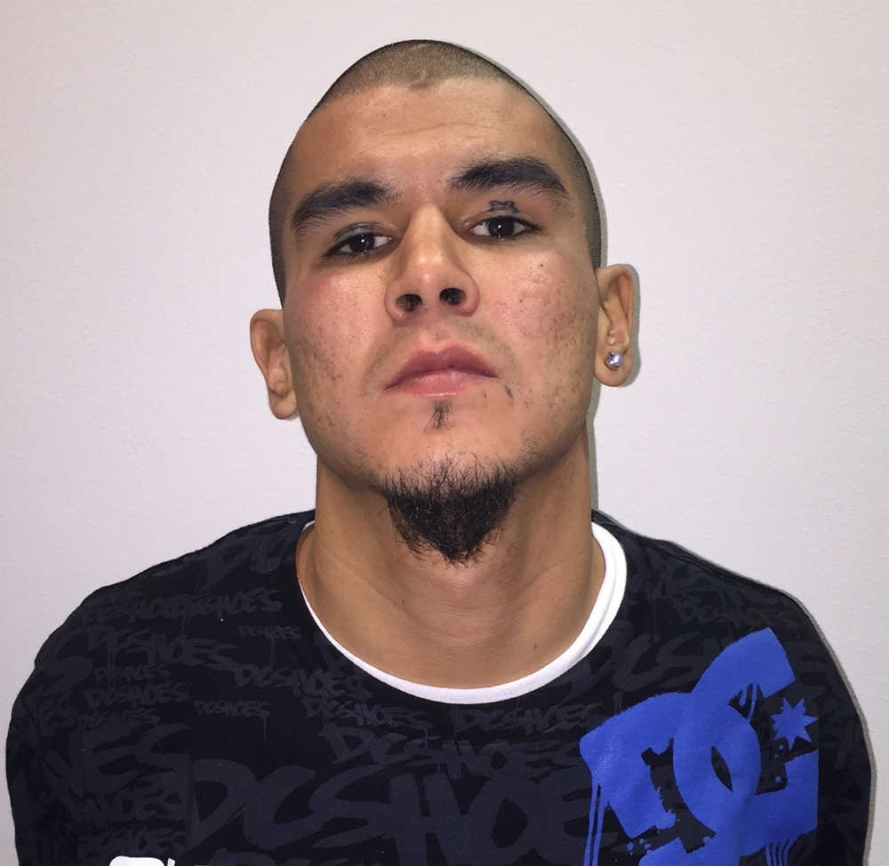 This photo released by Fairbanks Police Department shows Anthony George Jenkins-Alexie. The 29-year-old man was arrested in a shooting that left an Alaska police officer seriously injured. Jenkins-Alexie, of Fairbanks, is facing charges of attempted murder, assault and other counts in connection with the shooting early Sunday of Sgt. Allen Brandt. (Fairbanks Police Department  via AP)
