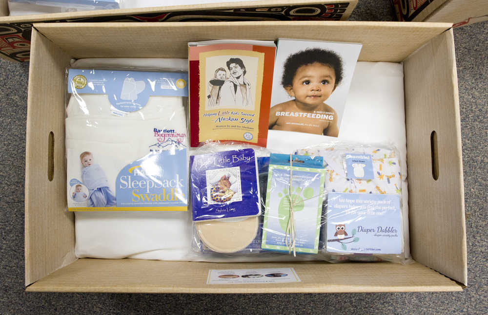 The Bartlett Regional Hospital baby boxes contain a small bed pad and covering, diapers, books and other things to help a family getting started with a new baby.