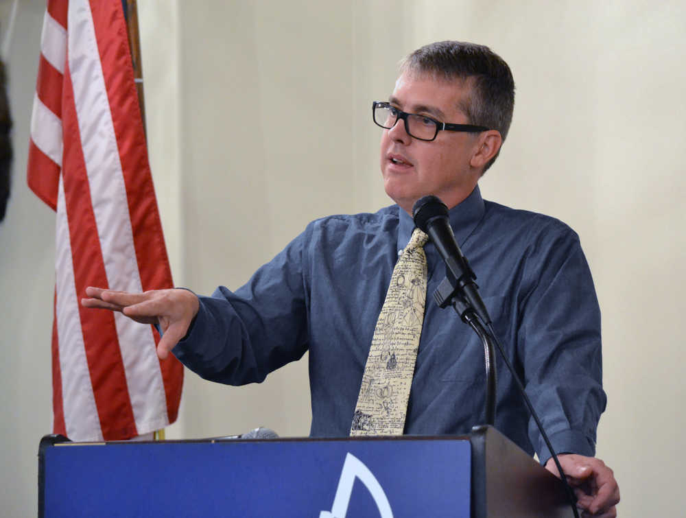 City Manager Rorie Watt calls on the members of the Juneau Chamber of Commerce to pressure state legislators into passing a sustainable budget during the next legislative session.