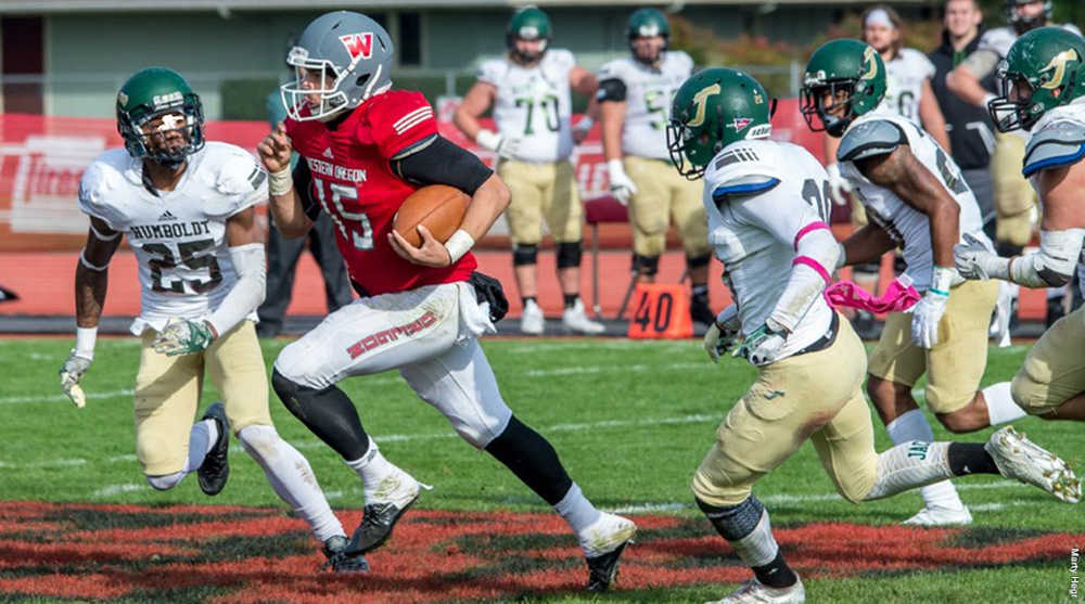 Western Oregon University quarterback Phillip Fenumiai, shown running the ball, was recently named GNAC Player of the Week.