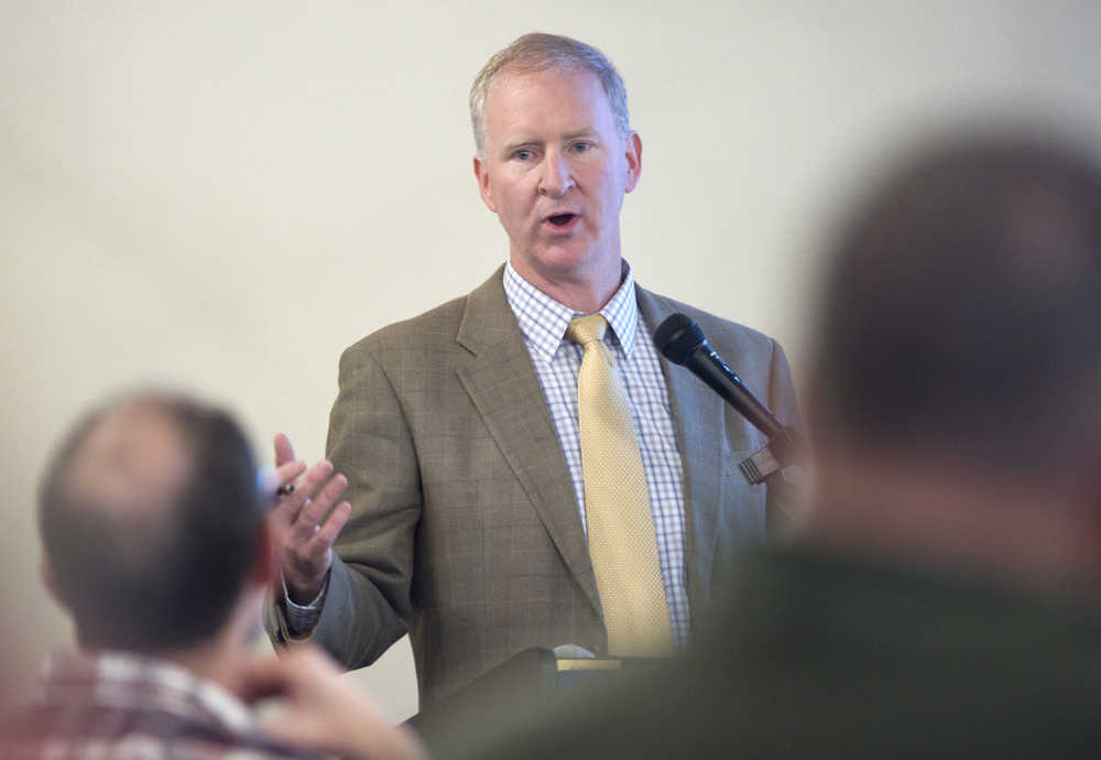 Brian Holst, executive director of the Juneau Economic Development Council, speaks to the Juneau Chamber of Commerce during its weekly luncheon at the Moose Lodge on Thursday.