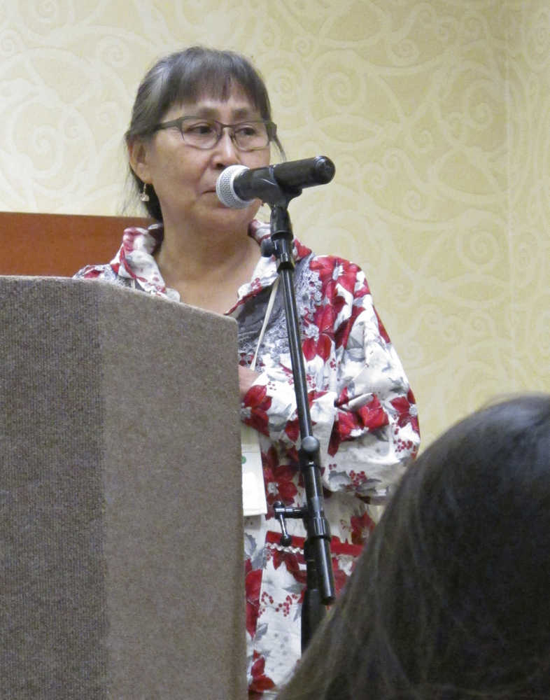 Bernadette Yaayuk Alvanna-Stimpfle, an Alaska Native language preservation expert, speaks Wednesday at tribal education summit in Anchorage, Alaska. Organizers say the two-day event hosted by the Inuit Circumpolar Council Alaska is part of an effort to improve the education system in culturally appropriate ways.