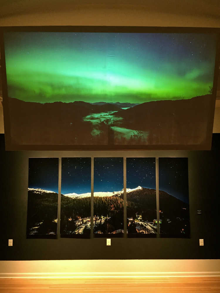Above, time lapse video runs in a loop. Below, "Nocturnal Deer," a photograph of Deer Mountain.
