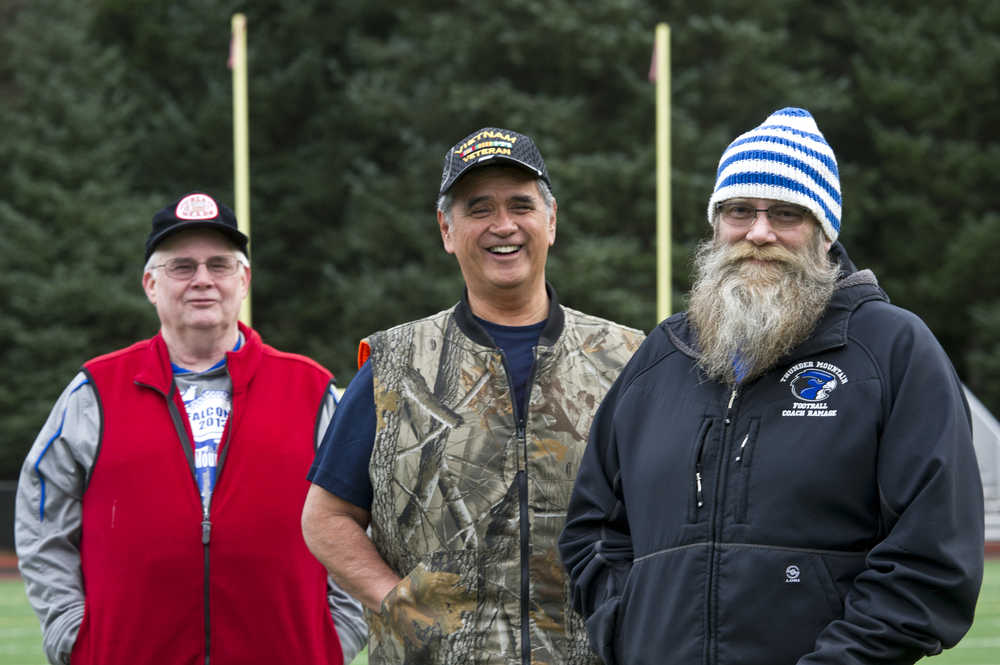 Jeep Rice, left, Ray Bradley, center, and Tom Ramage, photographed here at Adair-Kennedy Memorial Park on Wednesday, Nov. 9, 2016, are retiring from coaching football in Juneau. All have coached for the Juneau Youth Football League, Juneau-Douglas High School and Thunder Mountain High School.