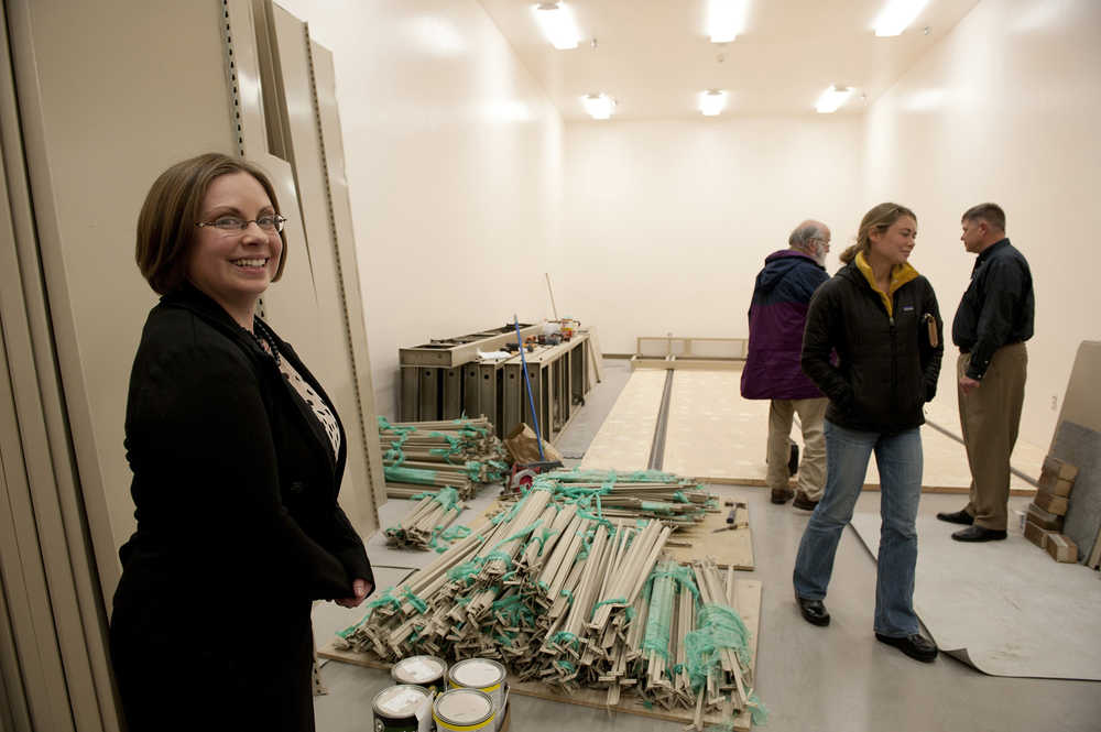In this Oct. 13 photo, Kristy Griffin, Sitka History Museum curator of collections and exhibits, left, gives a tour of the new museum's archive room. The museum is slated to open next summer, just in time for the 150th anniversary of the transfer of Alaska claims from Russia to the United States.