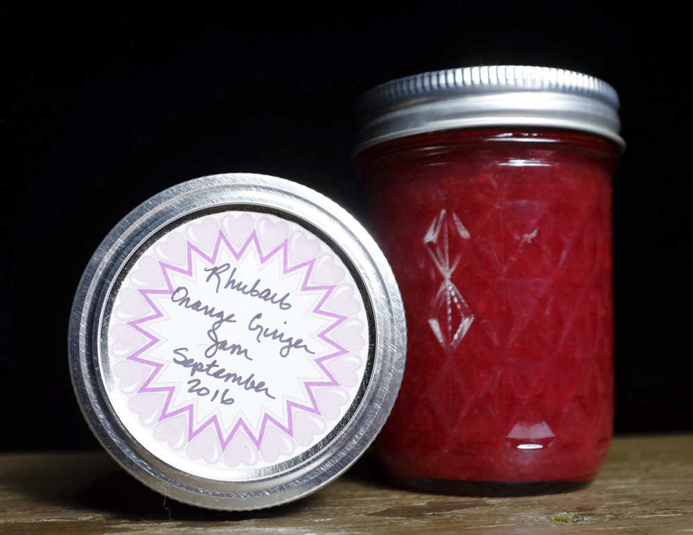 In this Tuesday, Nov. 15, 2016 photo, a jar of jam made by Julie Lekwauwa is displayed in Ketchikan, Alaska. Kekwauwa makes her jam and jelly from home using eight-ounce jars.  When Lekwauwa turned 14, she started making jam on her own after lessons at home and has kept it up for more than two decades, relying on the huge variety of plants and berries that Ketchikan has to offer. (Nick Bowman /Ketchikan Daily News via AP)