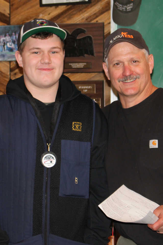 Southeast Trap Tournament high scorer Ruger Parker, left, with tournament director Mark Kappler. Parker, a Sitka resident, won the Varsity Division at the annual shoot, hitting 182 of 200 targets.