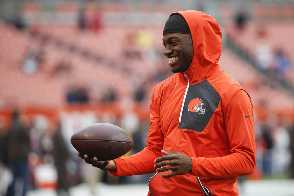 In this Oct. 30 photo, Cleveland Browns quarterback Robert Griffin III attends practice before an NFL football game against the New York Jets in Cleveland. Robert Griffin III has been cleared for non-contact drills, but isn't ready to practice. Griffin has been sidelined since breaking a bone in his left shoulder in the opener against Philadelphia. (Ron Schwane | The Associated Press file)