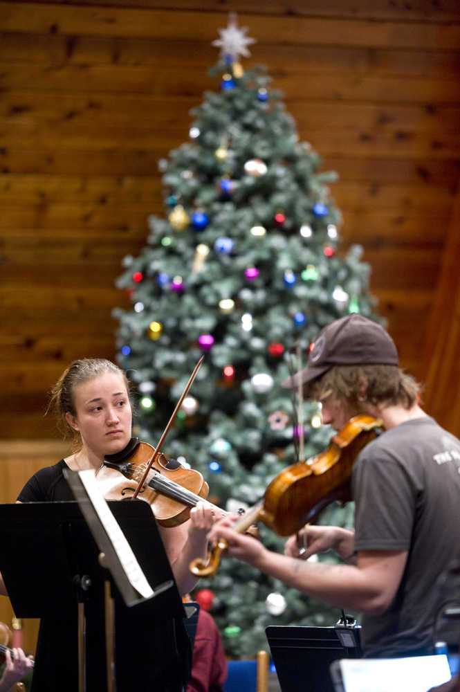 Violin soloists Lindsay Clark and David Miller perform Corelli's double violin concerto during rehearsal by the Juneau Bach Society at Northern Lights United Church on Tuesday, Nov. 29, 2016. The Society performs its annual holiday concerts Saturday, Dec. 3 at8 p.m. at Northern Light United Church and Sunday, Dec. 4 at 3 p.m. at Chapel by the Lake.