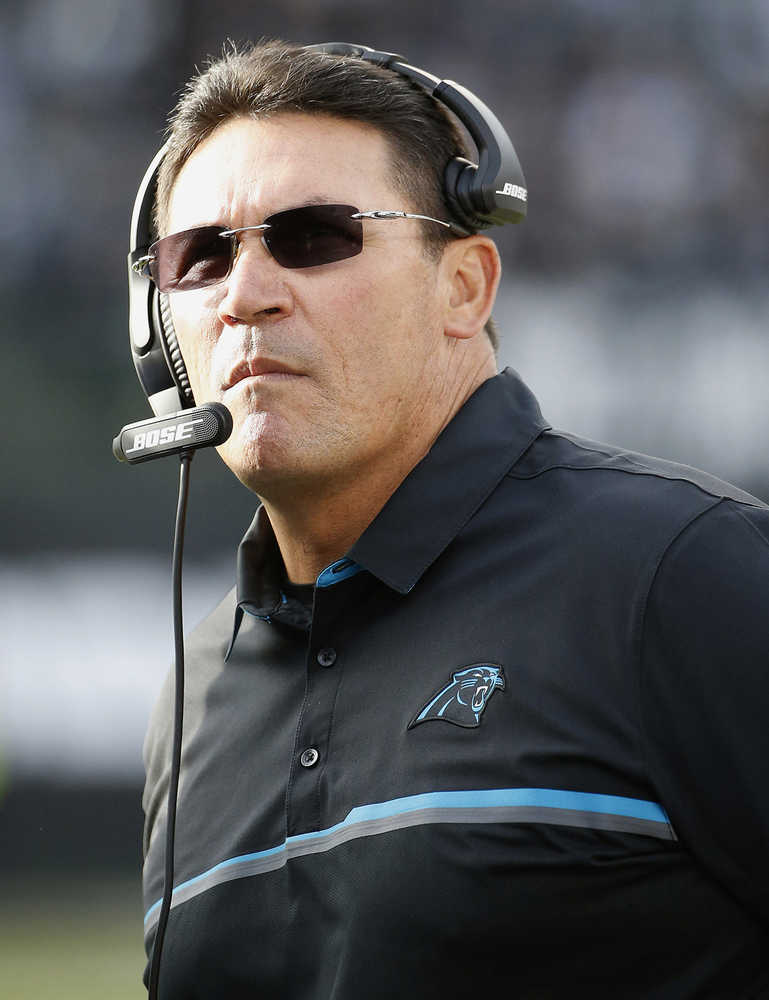 FILE - In this Sunday, Nov. 27, 2016 file photo, Carolina Panthers head coach Ron Rivera watches during the second half of an NFL football game against the Oakland Raiders in Oakland, Calif.  For the seventh time in five years, the Panthers and Seahawks will meet on Sunday night, Dec. 4, 2016 each with a different sense of urgency heading into the final month of the regular season.  (AP Photo/Tony Avelar, File)