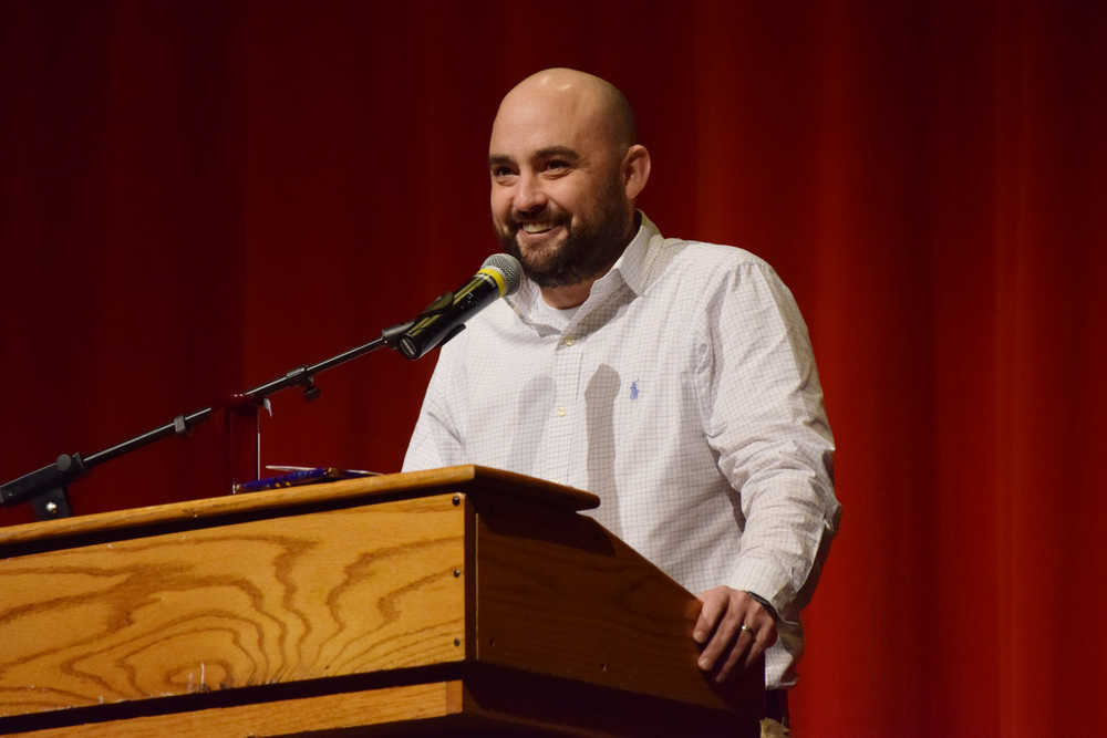 Photo by Megan Pacer/Peninsula Clarion James Harris, an English teacher at Soldotna High School, accepts his title as the 2017 Alaska Teacher of the Year during an assembly Tuesday, Nov. 6, 2016 at the school in Soldotna, Alaska.