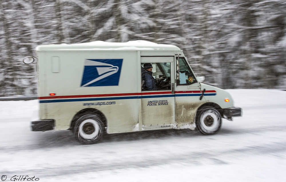 The mail has to get through - the US Mail delivery service hard at work out the road.