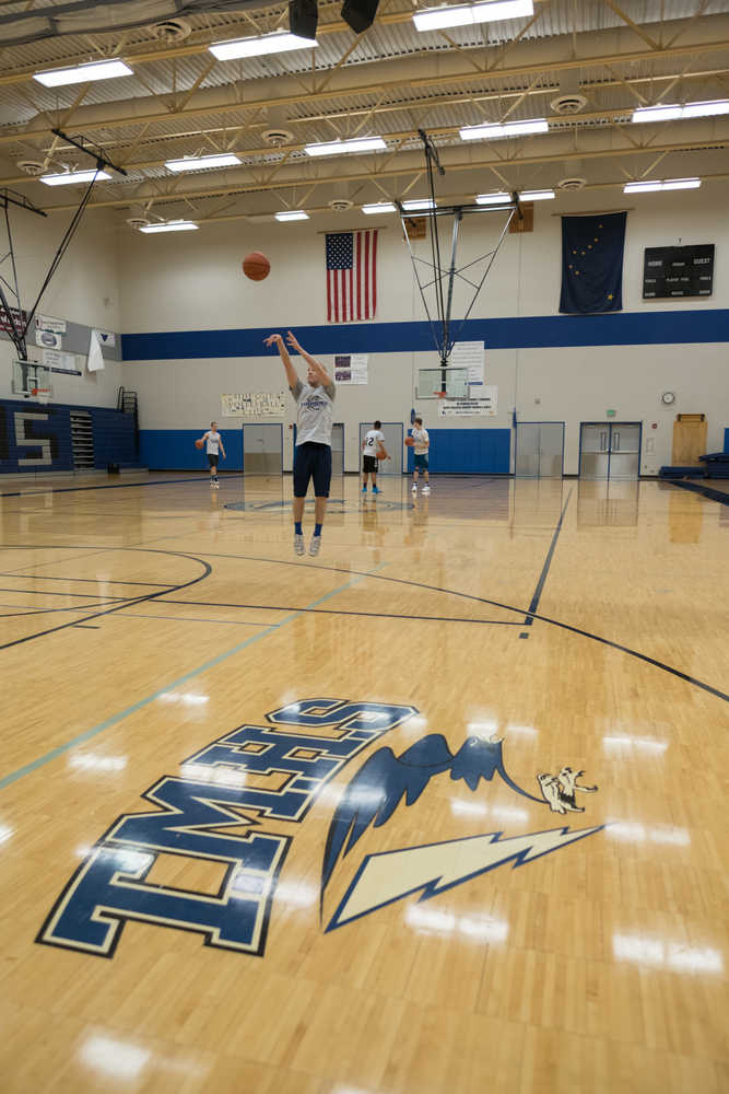 Thunder Mountain's Chase Saviers shoots during their practice held Dec. 19 at Thunder Mountain High School.