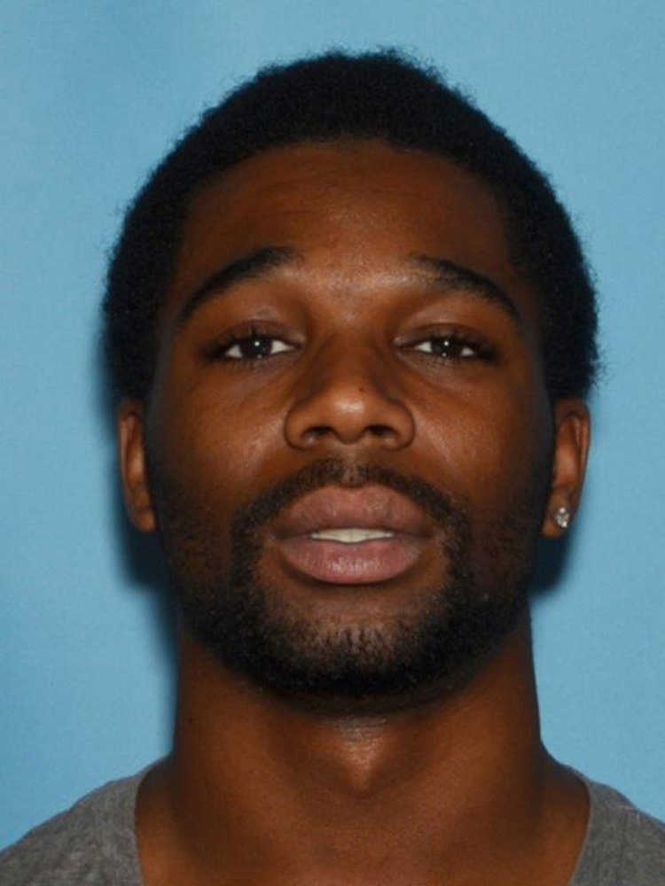 This undated booking photo provided by the Anchorage Police Department shows Lamarkus Jayquann Mann. A suspect has been arrested and Mann is being sought in an Anchorage robbery and shooting that left two people dead on Christmas Eve. (Anchorage Police Department via AP)