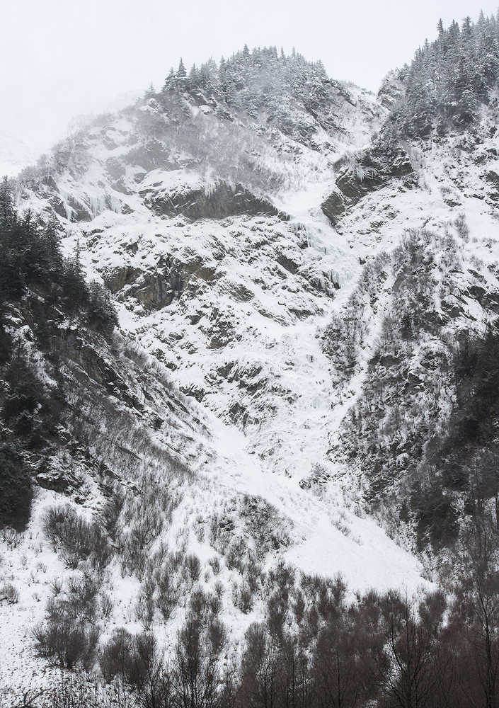 The remnants of a small avalanche sit above the Flume Trail on Mount Juneau on Thursday.
