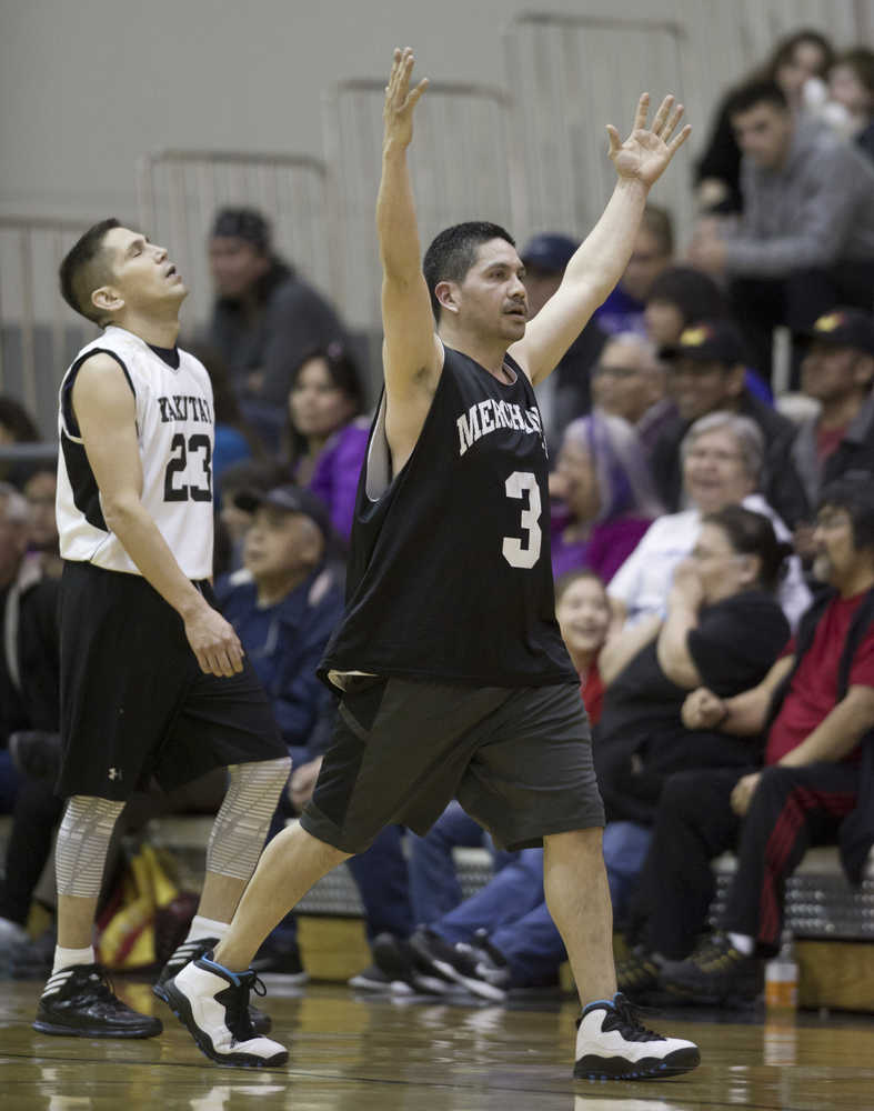 Metlakatla's Gogert celebrates Metlakatla's last-second win as Yakutat's Ralph Johnson reacts to the loss during their "C" bracket game in the 2016 Juneau Lions Club 70th Gold Medal Basketball Tournament at Juneau-Douglas High School on March 21.