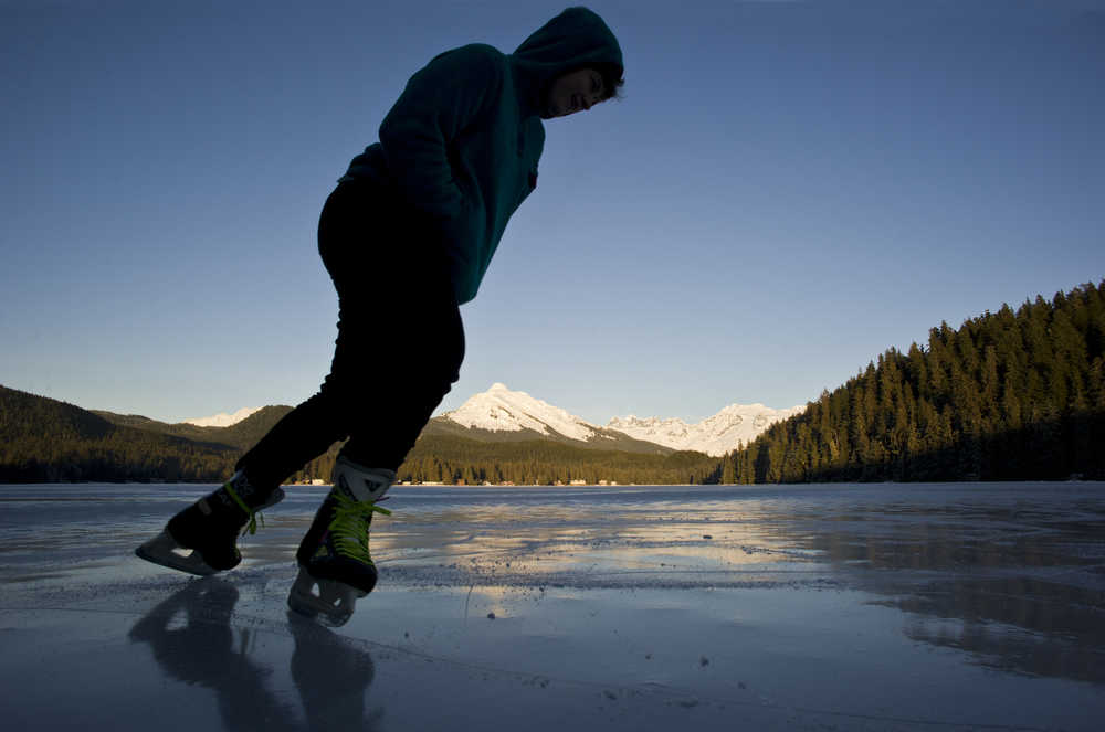 Sadie Ingalls skates on a smooth piece of ice at Auke Lake on Tuesday, Jan. 3, 2017.