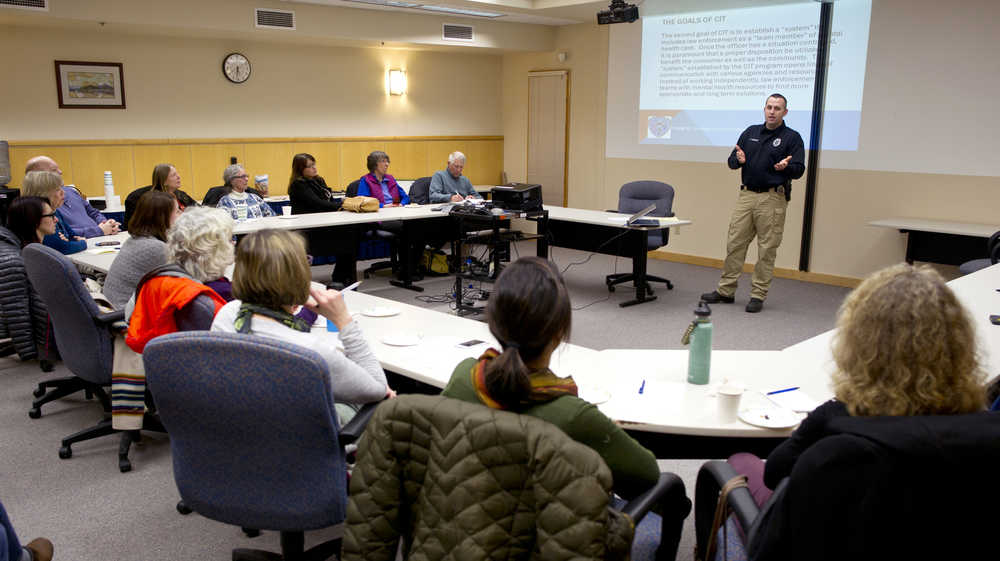 Juneau Police Department Detective Sterling Salisbury discusses how their department uses Crisis Intervention Team training to improve their response to individuals in mental health crisis at a public forum hosted by NAMI Juneau at Bartlett Regional Hospital on Tuesday, Jan. 10, 2017.