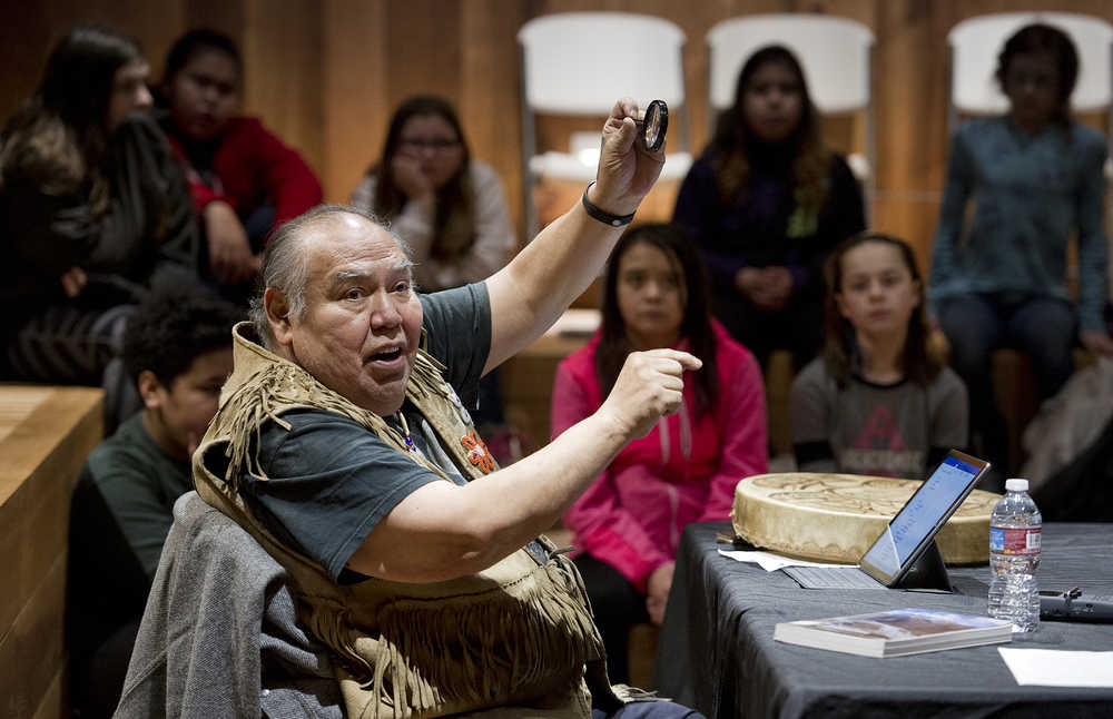 David Katzeek sharing information from a traditional cultural perspective to about 50 sixth grade students from Dzantik'i Heeni Middle School as part of the Voices of the Land project in the Clan House at the Walter Soboleff Center on Friday, Jan. 13, 2017. Through the program, Voices on the Land, Sealaska Heritage Institute is integrating performing arts and digital storytelling into six Juneau schools over three years through artists in residence, digital storytelling and a teacher training academy. Participating schools include Gastineau Elementary, Harborview Elementary, Dzantik'i Heeni Middle School, Floyd Dryden Middle School, Riverbend Elementary and Glacier Valley Elementary. The Tlingit language will be integrated into the activities.
