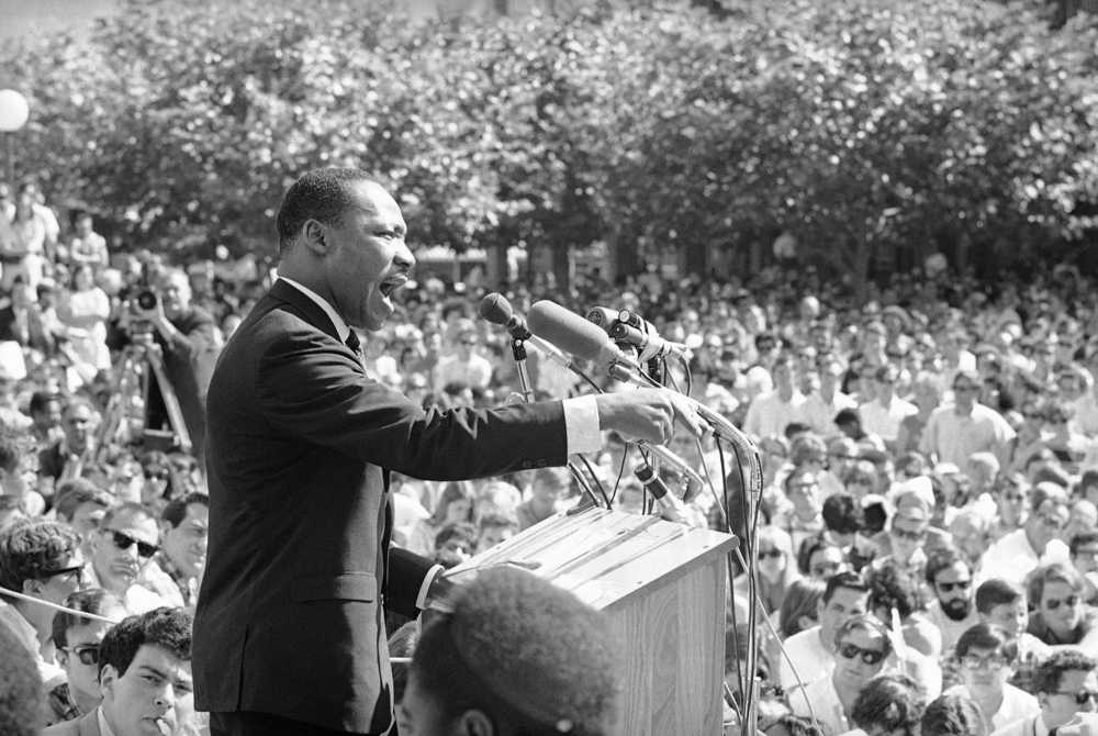 In this May 17, 1967 photo, Dr. Martin Luther King speaks at the University of California administration building in Berkeley, California.