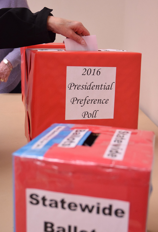A voter casts a ballot in the 2016 Republican Presidential Poll on March 1, 2016 in Centennial Hall's Egan Ballroom.