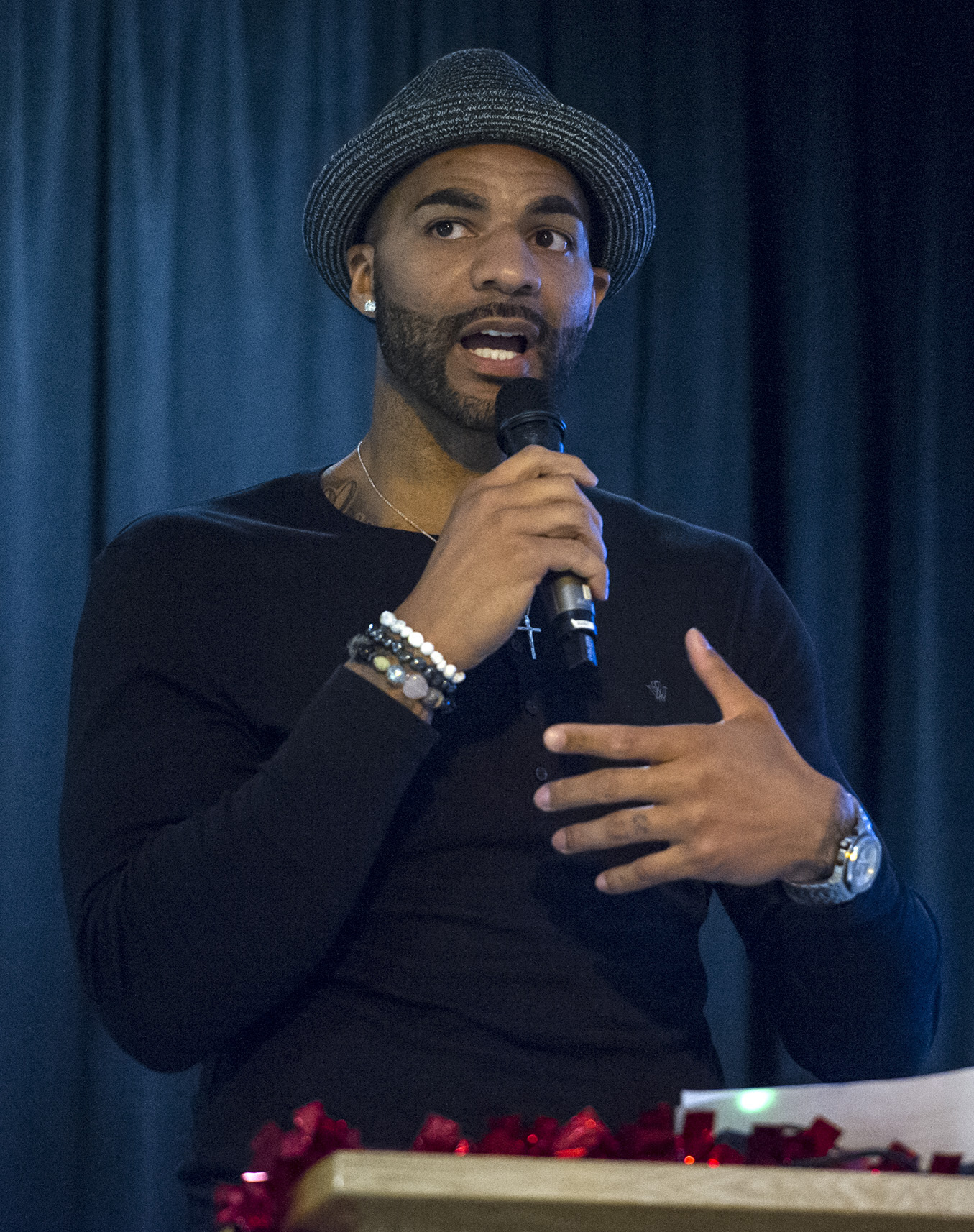 Former NBA all-star and Juneau-Douglas High School standout Carlos Boozer made a surprise visit during the JDHS Basketball Awards Banquet at the Elizabeth Peratrovich Hall on Tuesday evening. Boozer came to help celebrate the team’s first state championship since he helped JDHS win one 18 years ago.